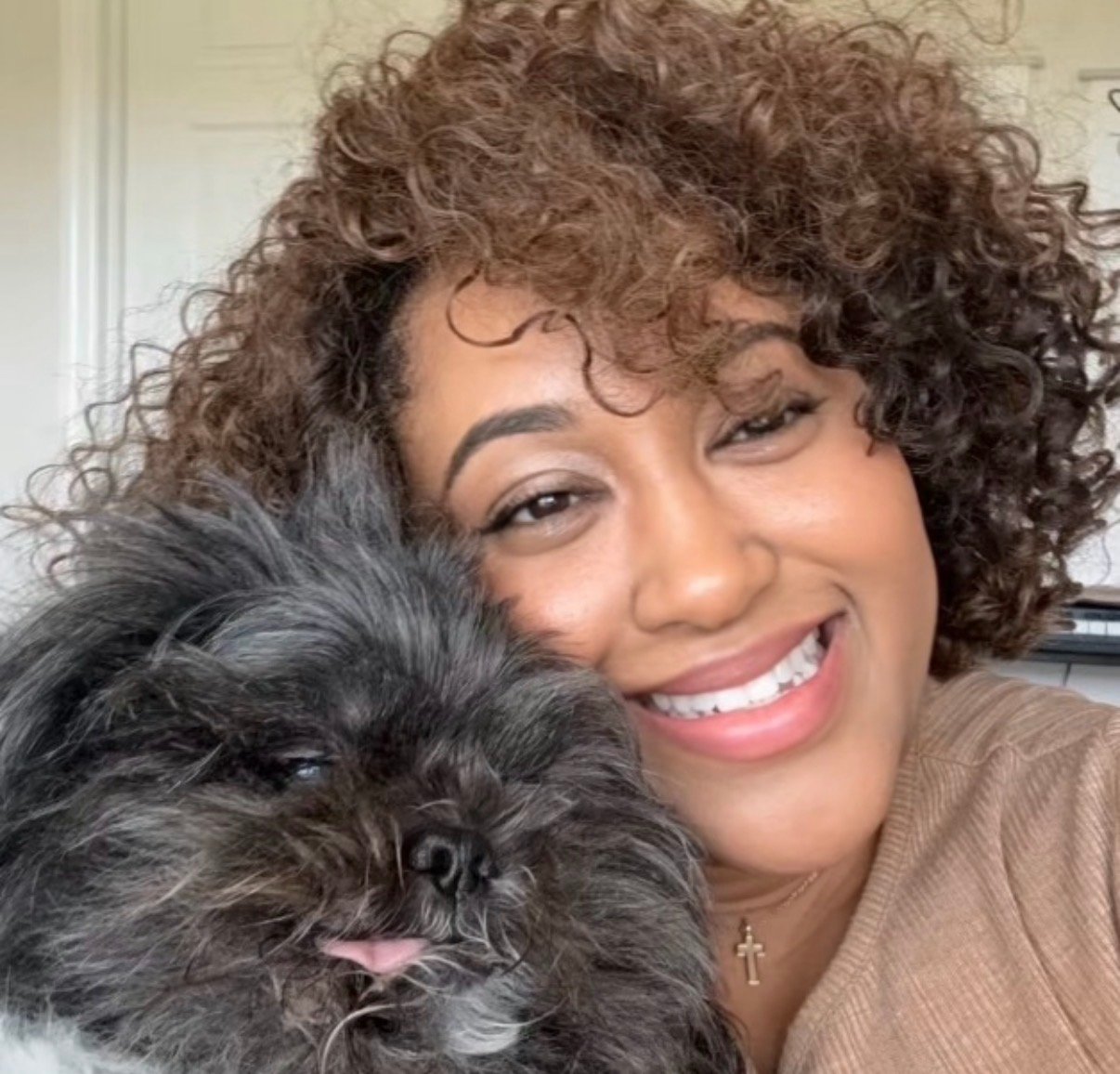 Gabrie'le Eato with her dog Win